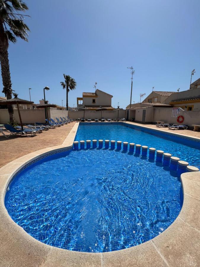 Ferienwohnung Bonito Adosado Con Piscina A 200 M De La Playa El Mojon  Exterior foto